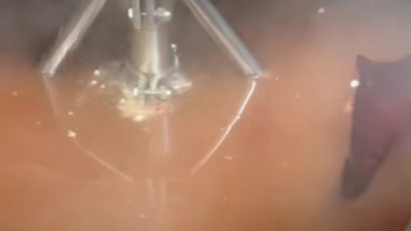 Industrial kettle mixing a gummy batch during commercial production and process control